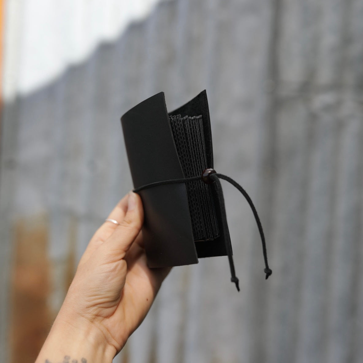 Polaroid Handmade Leather Photo Book in hand (Black Bifold) - KWLeatherCo
