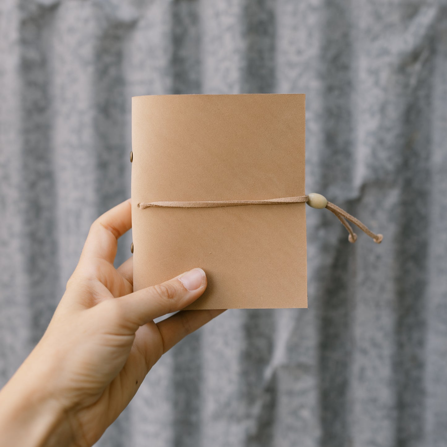 Polaroid Handmade Leather Photo Book in hand (Sand Bifold) - KWLeatherCo